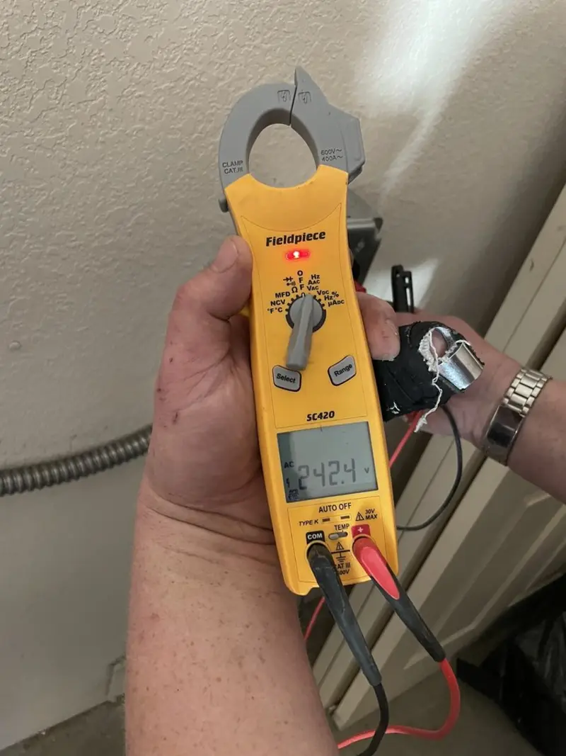 Voltage testing with clamp meter during Electrical Installation Services in Santa Clarita